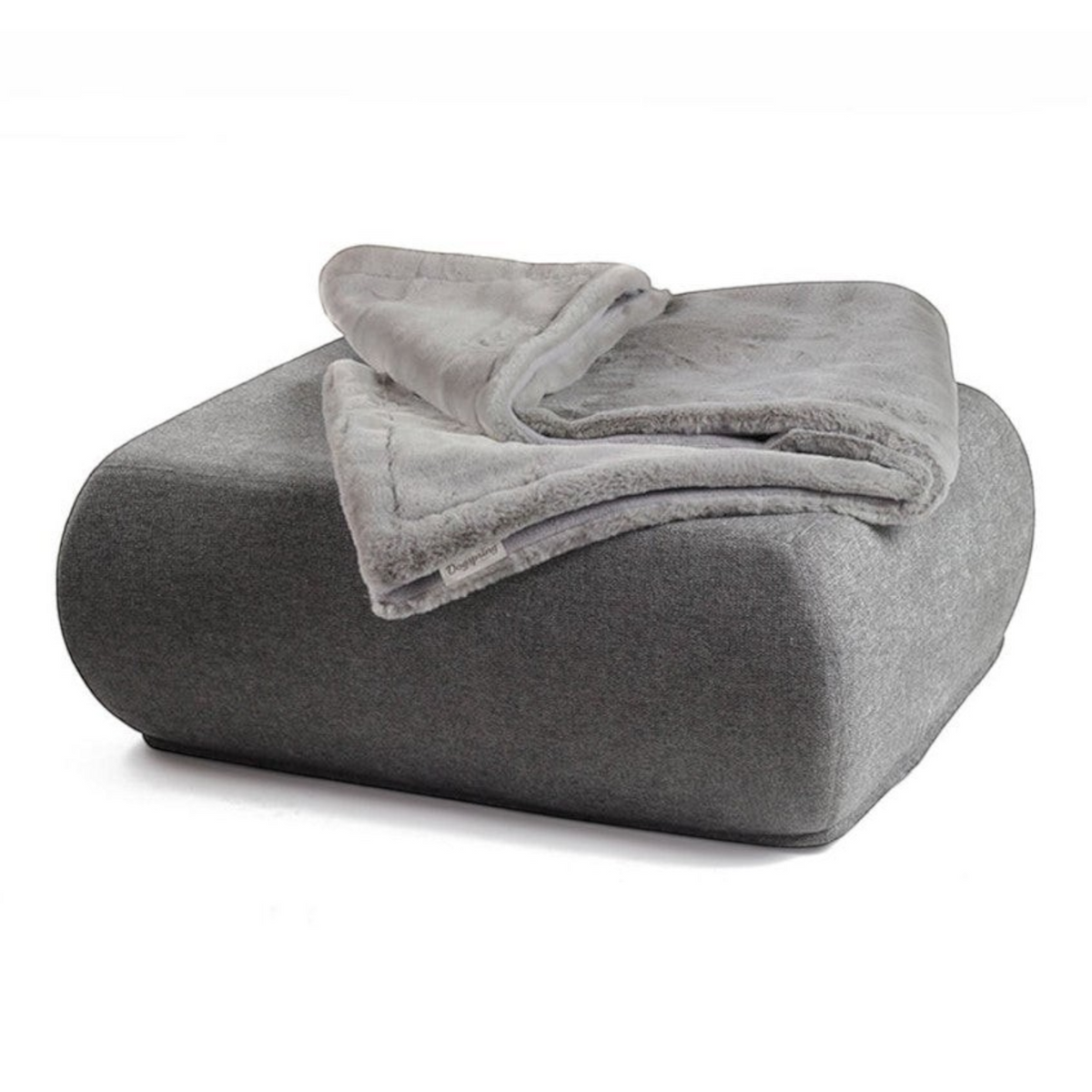 havaneser.shop Wohndecke aus grauem Webpelz und weichem Fleece, elegant gefaltet auf einem passenden Sitzhocker